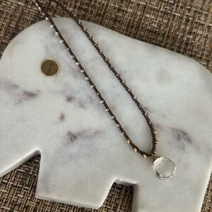 Handmade braided and wire wrap necklace with natural clear quartz